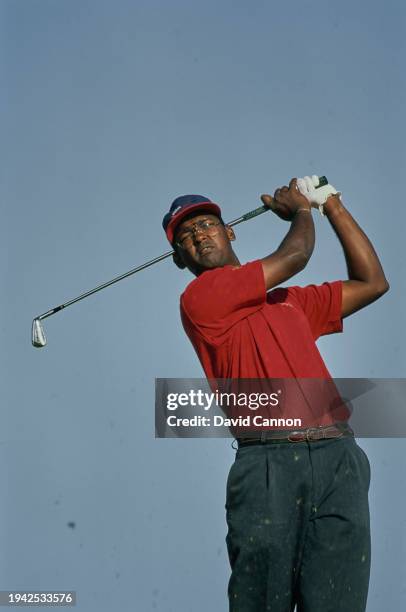 Vijay Singh from Fiji plays an iron shot off the fairway during the 1993 Dubai Desert Classic golf tournament on 31st January 1993 at the Emirates...