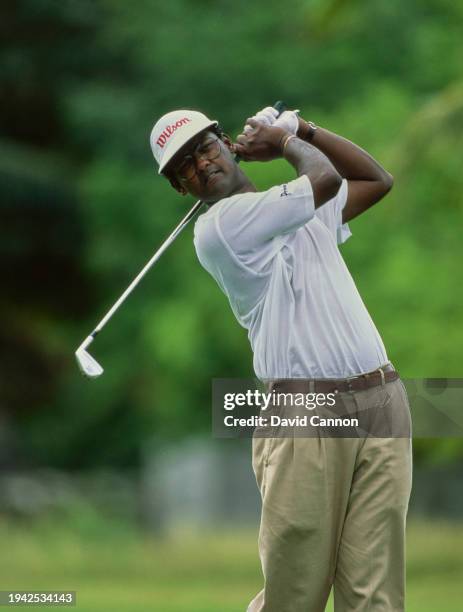 Vijay Singh from Fiji plays an iron shot off the fairway during the 1993 Johnnie Walker World Golf Championship on 14th December 1993 at the Tryall...