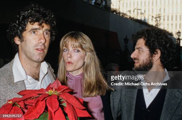 American actor Elliott Gould, American actress Susan Blakely an American producer Steve Jaffe attend the Golden Apple Awards, US, circa 1975.