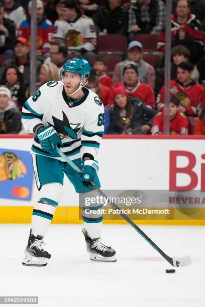 Mike Hoffman of the San Jose Sharks skates with the puck during the second period against the Chicago Blackhawks at the United Center on January 16,...