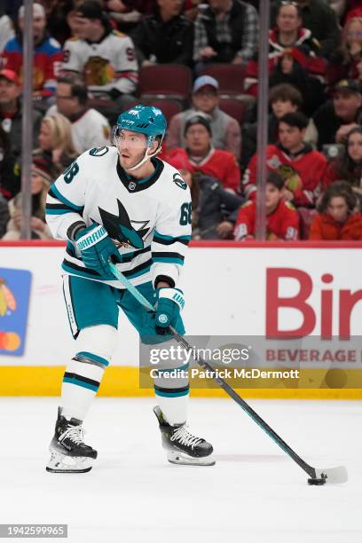 Mike Hoffman of the San Jose Sharks skates with the puck during the second period against the Chicago Blackhawks at the United Center on January 16,...