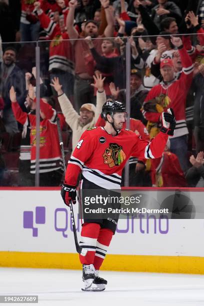 Boris Katchouk of the Chicago Blackhawks celebrates after scoring the game winning shootout goal against the San Jose Sharks at the United Center on...