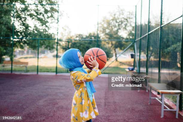 father and child playing basketball - children playing outside stock pictures, royalty-free photos & images