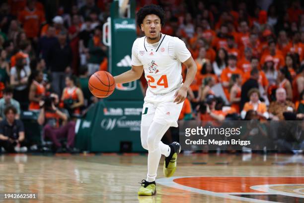Nijel Pack of the Miami Hurricanes dribbles the ball against the Florida State Seminoles during the first half of the game at Watsco Center on...