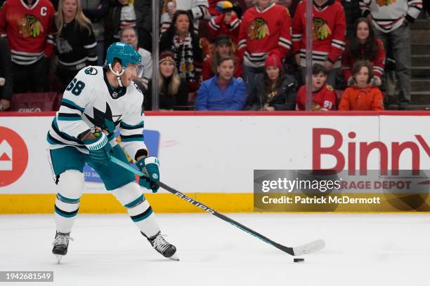 Mike Hoffman of the San Jose Sharks skates with the puck during a shootout against the Chicago Blackhawks at the United Center on January 16, 2024 in...