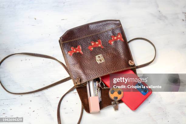 contents of a purse - purse contents stock pictures, royalty-free photos & images