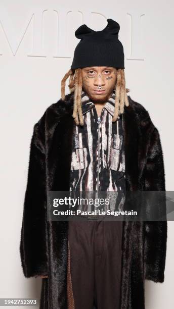 Trippie Redd attends the Amiri Menswear Fall/Winter 2024-2025 show as part of Paris Fashion Week on January 18, 2024 in Paris, France.