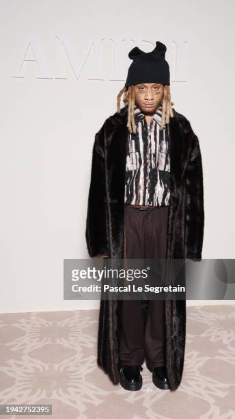 Trippie Redd attends the Amiri Menswear Fall/Winter 2024-2025 show as part of Paris Fashion Week on January 18, 2024 in Paris, France.