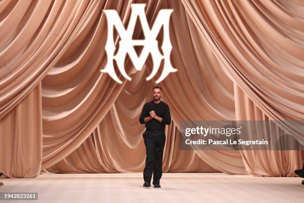 Fashion designer Mike Amiri walks the runway during the Amiri Menswear Fall/Winter 2024-2025 show as part of Paris Fashion Week on January 18, 2024...