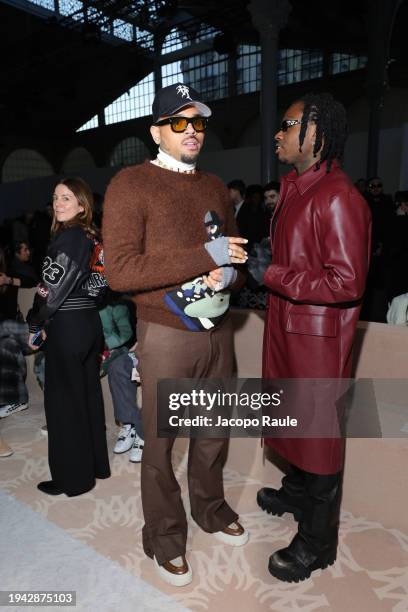 Gunna and Chris Brown attend the Amiri Menswear Fall/Winter 2024-2025 show as part of Paris Fashion Week on January 18, 2024 in Paris, France.