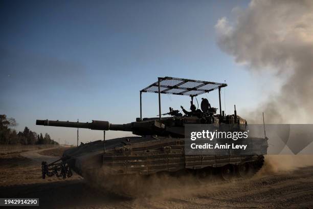 An Israeli tank moves along the border with Gaza Strip on January 21, 2024 in Southern Israel, Israel. Israel increased air raids in the south of the...