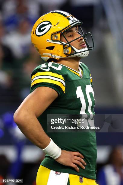 Jordan Love of the Green Bay Packers reacts to a play against the Dallas Cowboys during the second quarter of the NFC Wild Card Playoff game at AT&T...