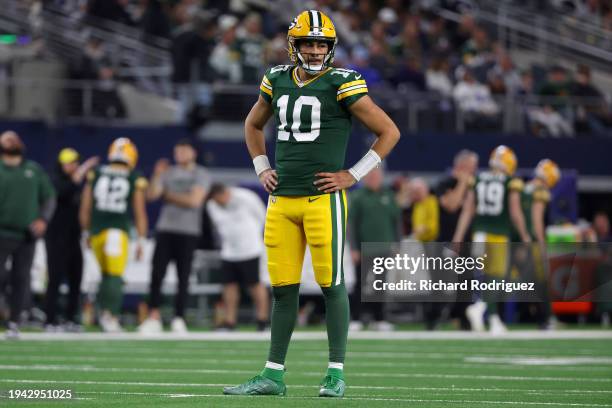 Jordan Love of the Green Bay Packers reacts to a play against the Dallas Cowboys during the second quarter of the NFC Wild Card Playoff game at AT&T...