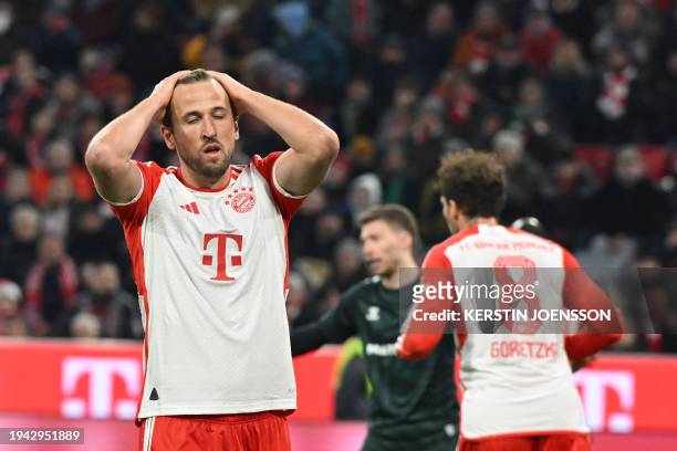 Bayern Munich's English forward Harry Kane reacts during the German first division Bundesliga football match between Bayern Munich and Werder Bremen...