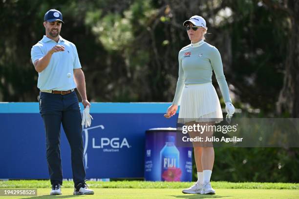 Charley Hull of England and professional baseball player Whit Merrifield stand on the ninth teeduring the first round of the Hilton Grand Vacations...