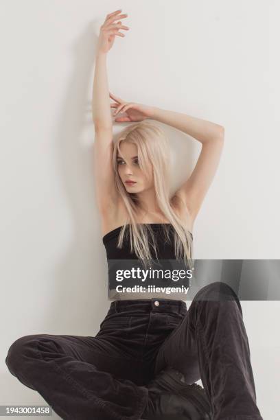 fashion model in studio. blonde woman - black high heels stock pictures, royalty-free photos & images