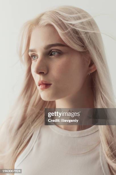 blonde woman in studio. beauty - of natural hair styles stock pictures, royalty-free photos & images