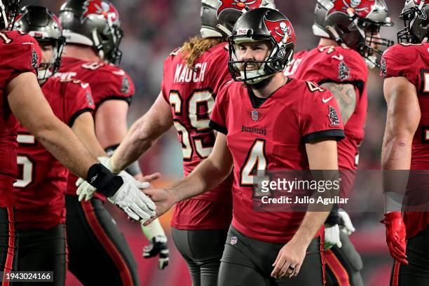 Chase McLaughlin of the Tampa Bay Buccaneers celebrates a kick against the Philadelphia Eagles during the third quarter in the NFC Wild Card Playoffs...