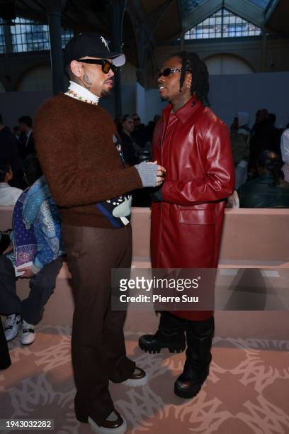 Chris Brown and Gunna attend the Amiri Menswear Fall/Winter 2024-2025 show as part of Paris Fashion Week on January 18, 2024 in Paris, France.