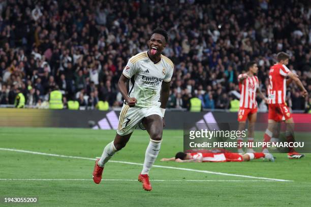 Real Madrid's Brazilian forward Vinicius Junior celebrates scoring his team's second goal during the Spanish League football match between Real...