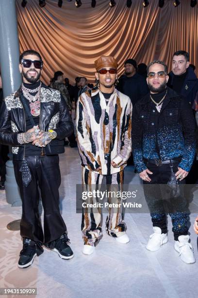 Anuel AA, Ozuna and a guest attends the Amiri Menswear Fall/Winter 2024-2025 show as part of Paris Fashion Week on January 18, 2024 in Paris, France.