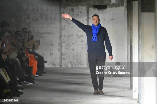 Belgian Fashion Designer, Dries van Noten acknowledges the audience during the Dries van Noten Menswear Fall/Winter 2024-2025 show as part of Paris...