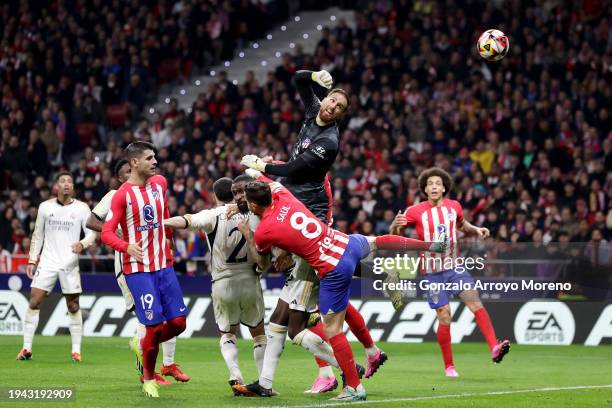 Jan Oblak of Atletico Madrid scores an own goal to make it the first goal for Real Madrid during the Copa del Rey Round of 16 match between Atletico...