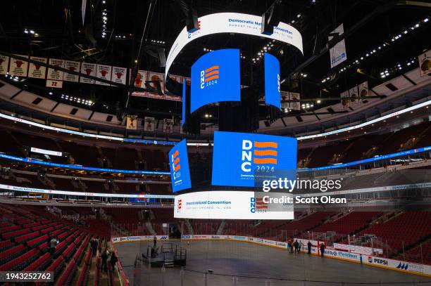 The logo for the Democratic National Convention is displayed on the scoreboard at the United Center during a media walkthrough on January 18, 2024 in...
