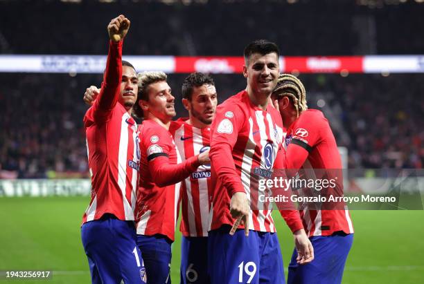 Alvaro Morata of Atletico Madrid celebrates scoring his team's second goal with teammates during the Copa del Rey Round of 16 match between Atletico...