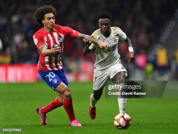 Axel Witsel of Atletico Madrid battles for possession with Vinicius Junior of Real Madrid during the Copa del Rey Round of 16 match between Atletico...