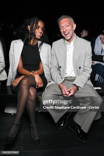 Narah Baptista and Vincent Cassel attend the AMI - Alexandre Mattiussi Menswear Fall/Winter 2024-2025 show as part of Paris Fashion Week on January...