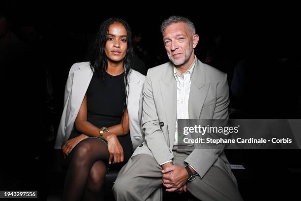 Narah Baptista and Vincent Cassel attend the AMI - Alexandre Mattiussi Menswear Fall/Winter 2024-2025 show as part of Paris Fashion Week on January...