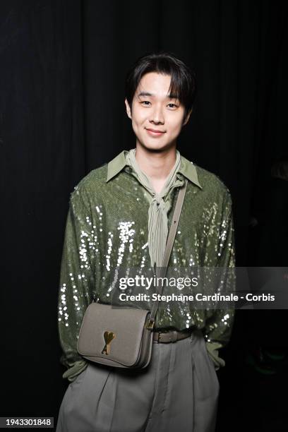 Choi Woo-shik attends the AMI - Alexandre Mattiussi Menswear Fall/Winter 2024-2025 show as part of Paris Fashion Week on January 18, 2024 in Paris,...