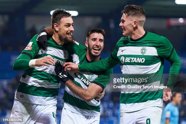 Sebastian Coates of Sporting CP celebrates with Goncalo Inacio and Viktor Gyokeres after scoring his team's fourth goal during the Liga Portugal...