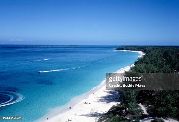 An aerial view of boats and beach lovers on Paradise Island Beach, on Paradise Island , Nassau, Bahamas, 1986. .