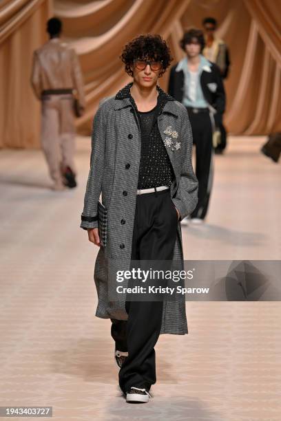 Model walks the runway during the Amiri Menswear Fall/Winter 2024-2025 show as part of Paris Fashion Week on January 18, 2024 in Paris, France.