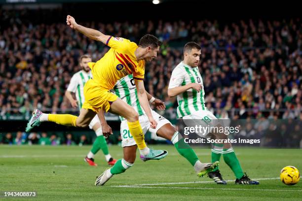 Robert Lewandowski of FC Barcelona, Abner Vinicius of Real Betis, Sokratis Papastathopoulos of Real Betis during the LaLiga EA Sports match between...