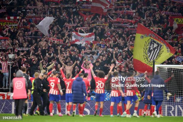 Players of Atletico Madrid celebrate with the fans after the Copa del Rey Round of 16 match between Atletico de Madrid and Real Madrid at Civitas...