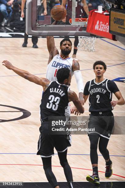 Paul George of the LA Clippers dunks the ball during the game against the Brooklyn Nets on January 21, 2024 at Crypto.Com Arena in Los Angeles,...