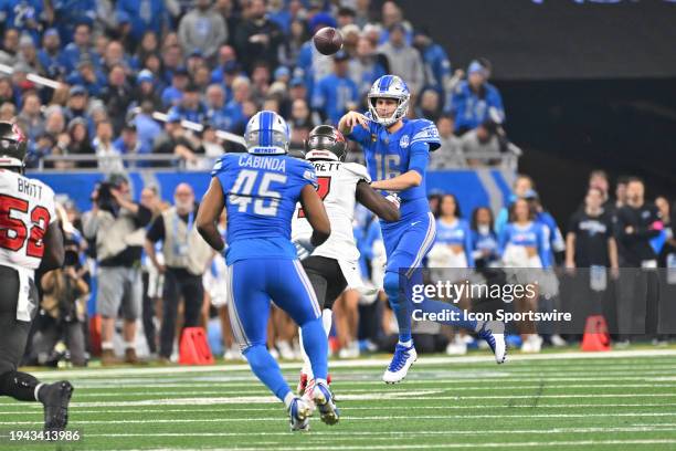 Detroit Lions quarterback Jared Goff throws over the middle to Detroit Lions fullback Jason Cabinda during the NFC Divisional playoff game between...