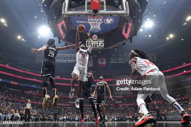 Paul George of the LA Clippers drives to the basket during the game against the Brooklyn Nets on January 21, 2024 at Crypto.Com Arena in Los Angeles,...