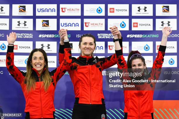 Valerie Maltais, Isabelle Weidemann and Ivanie Blondin of Canada stand on the podium after the women's team pursuit during the ISU Four Continents...