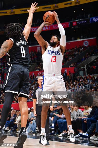 Paul George of the LA Clippers three point basket during the game against the Brooklyn Nets on January 21, 2024 at Crypto.Com Arena in Los Angeles,...