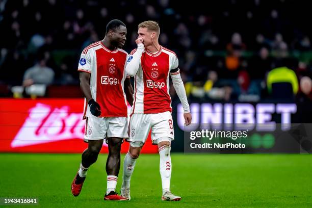 Ajax players Brian Brobbey and Kenneth Taylor are playing during the match between Ajax and RKC at the Johan Cruijff ArenA for the Dutch Eredivisie...