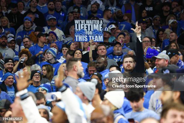 Detroit fan holds up a sign that states "We've Waited a Lifetime for this Team" during an NFL NFC Divisional playoff football game between the Tampa...
