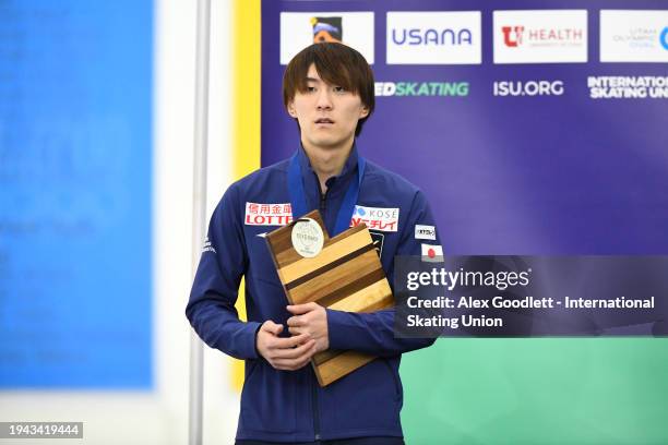 Silver medalist Taiyo Nonomura of Japan stands on the podium after the men's 1000 meter final during the ISU Four Continents Speed Skating...