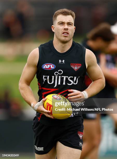 Zach Merrett of the Bombers in action during the Essendon Bombers training session at the NEC Hangar on January 22, 2024 in Melbourne, Australia.