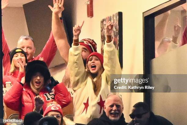 Brittany Mahomes, Jason Kelce, and Taylor Swift react during the second half of the AFC Divisional Playoff game between the Kansas City Chiefs and...