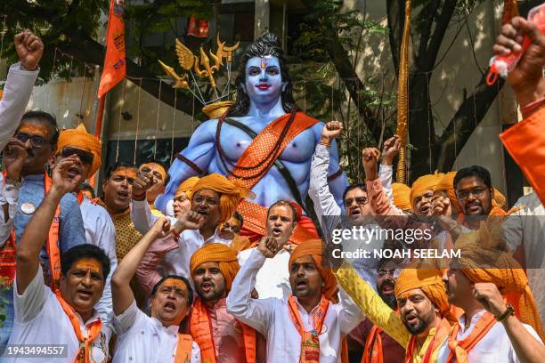 Hindu devotees chant slogans at a religious procession in Hyderabad on January 22 on the occasion of Ayodhya Ram temple's consecration ceremony.