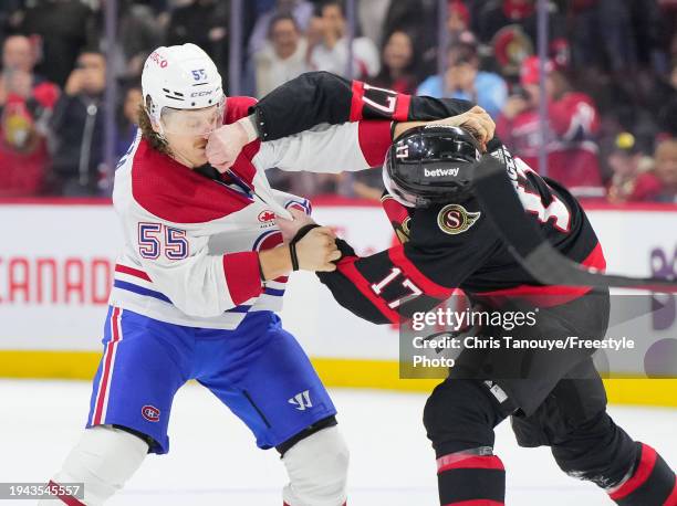 Zack MacEwen of the Ottawa Senators fights Michael Pezzetta of the Montreal Canadiens in the first period at Canadian Tire Centre on January 18, 2024...